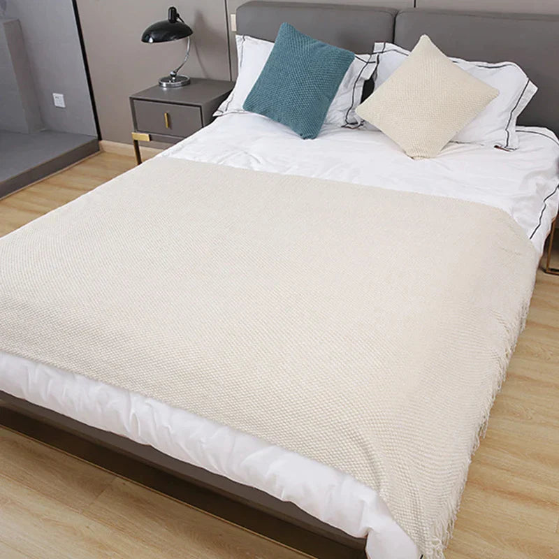Decorbites™ Gemütliche gestrickte Sofadecke mit Troddeln – Vielseitige Wohnraumausstattung und Umhang