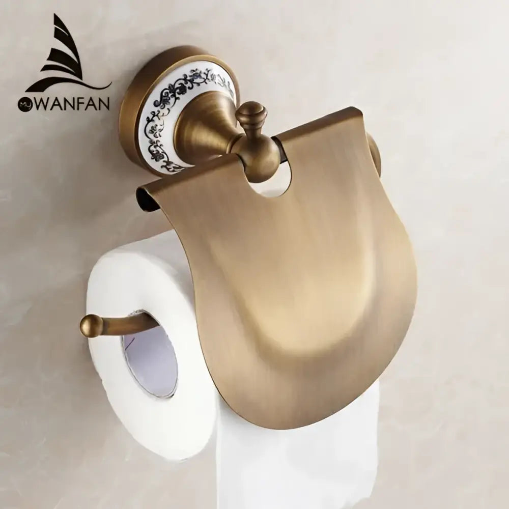 Antique brass wall mounted paper holder with ceramic base and elegant curved metal cover for bathroom decorbites brass wall