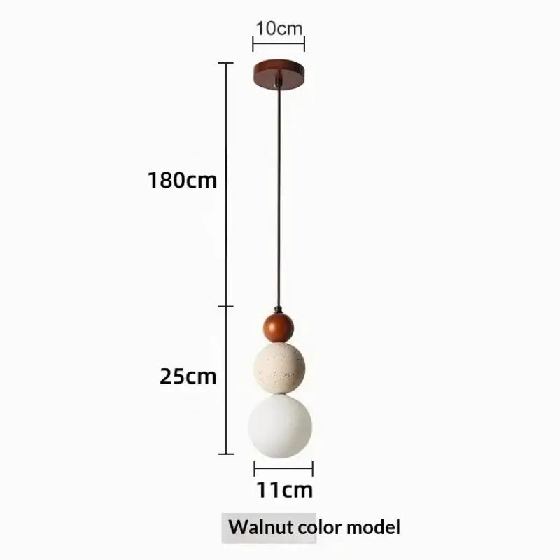 Bauhaus travertine stone and wood pendant light with three matte spherical shades in walnut off-white and white works beautifully
