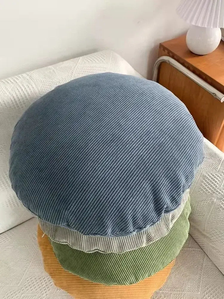 Stacked decorbites corduroy round pillow covers in soft blue sage green and mustard yellow for living room decor
