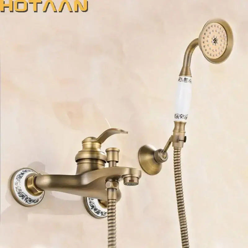 DecorBites™ antique brass hand held shower head kit featuring a wall-mounted faucet with white ceramic handle and blue floral patterns