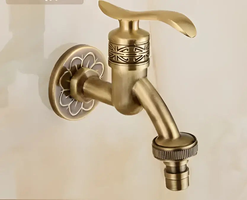 Antique brass-finished DecorBites™ garden bibcocks tap with ornate floral design for outdoor washing and more