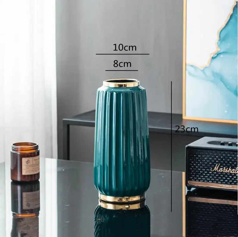 Teal ceramic candy jar with gold-toned metallic rim and fluted design from DecorBites apple hollow collection