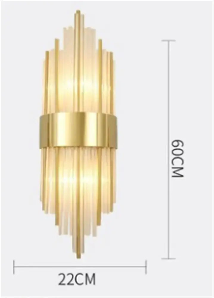 Gold-toned modern crystal wall sconce with vertical glass rods and central metallic band for bedroom living room decor