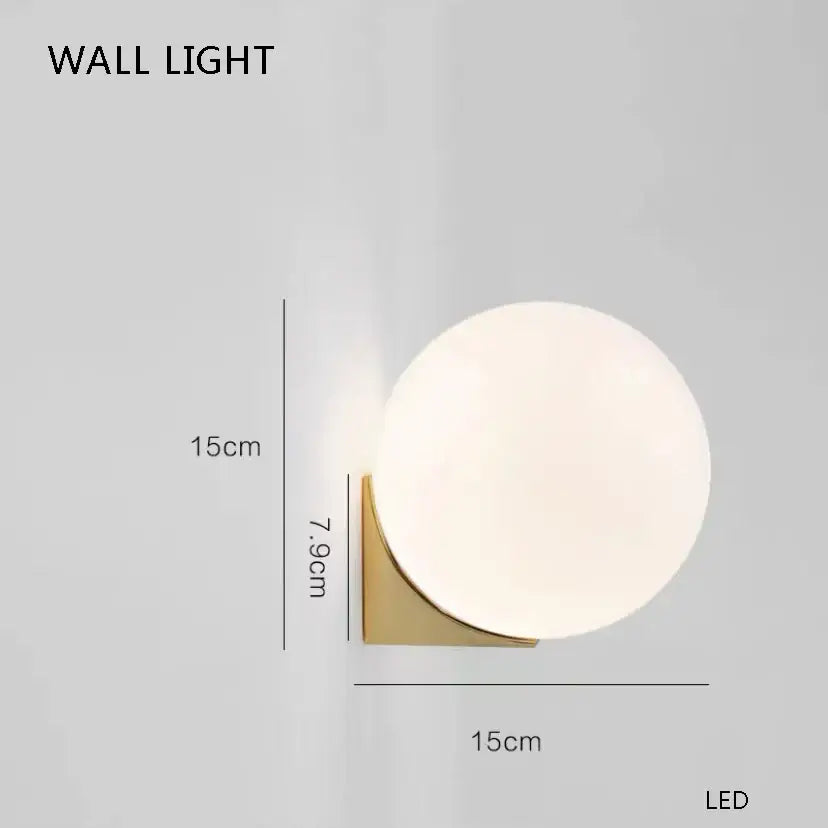 A decorbites black led floor lamp featuring a sleek matte white glass globe on a brushed gold metal bracket for decorative lighting