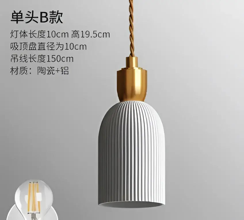 White ribbed ceramic pendant lamp with gold toned metal top and twisted cord paired with decorbites blue glass pendant lights