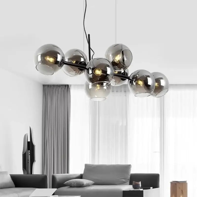 Modern black metal DecorBites LED pendant light chandelier with smoked glass globe shades for living and dining rooms
