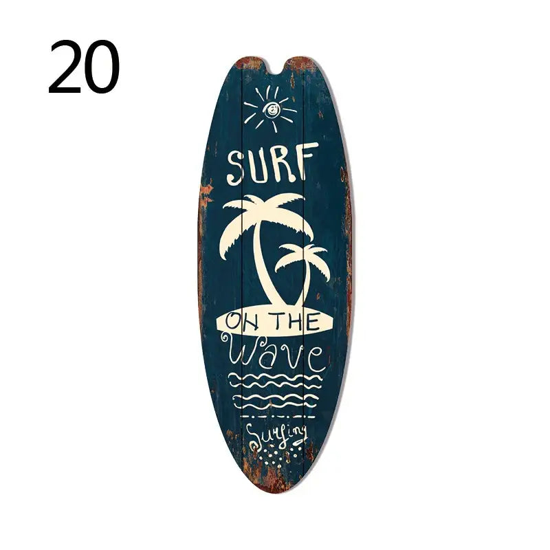 Dark teal wooden vintage surfboard door sign with white palm trees sun and surf on the wave text for beach home decor