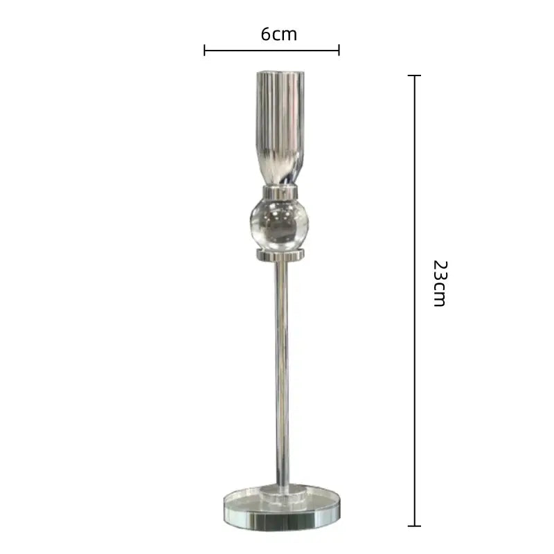 Silver metallic candlestick holder with fluted top and spherical middle, part of decorbites crystal glass dining set