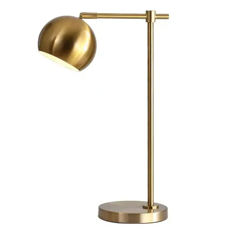 A sleek brushed gold vintage industrial desk lamp with spherical led shade ideal for bedroom decorbites gold vintage