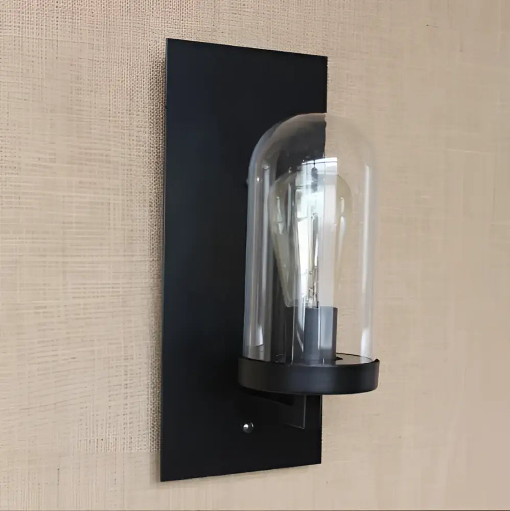 Black metal wall sconce with clear glass dome and exposed filament bulb for bedroom decorbites industrial edison vintage