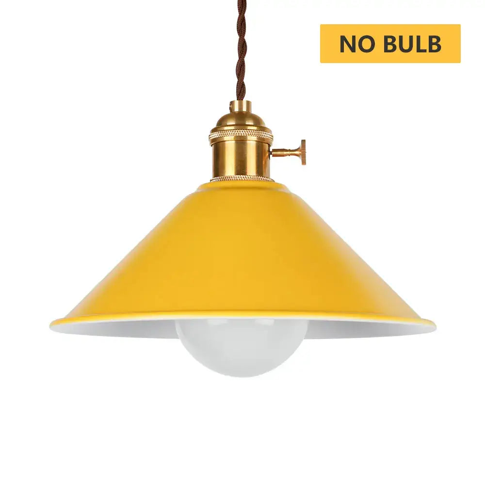 Yellow conical pendant light with brass hardware and braided brown cord in decorbites industrial vintage chandelier style