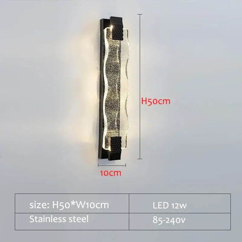 Luxury gold crystal led wall sconce with sleek wavy design and black stainless steel brackets for modern decorbites crystal led decor