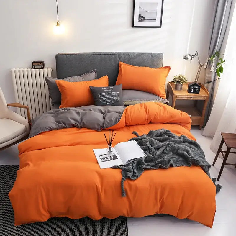 Luxury orange and gray duvet cover set with matching pillowcases and throw blanket for bedroom bedding use
