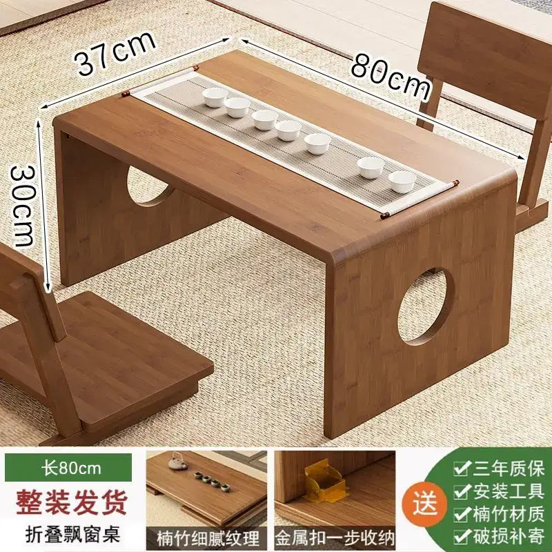 Minimalist light brown bamboo folding table with natural wood finish and built-in tray for six white ceramic teacups