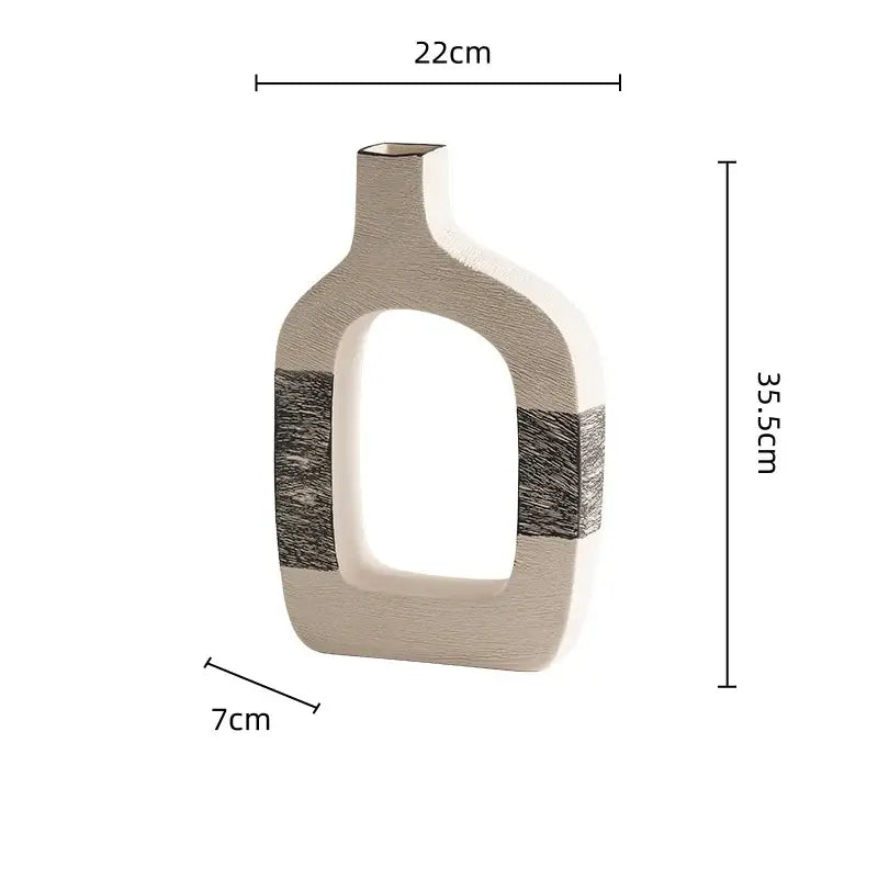 Minimalist ceramic flower vase with white and gray geometric stripes featuring textured black and white bands