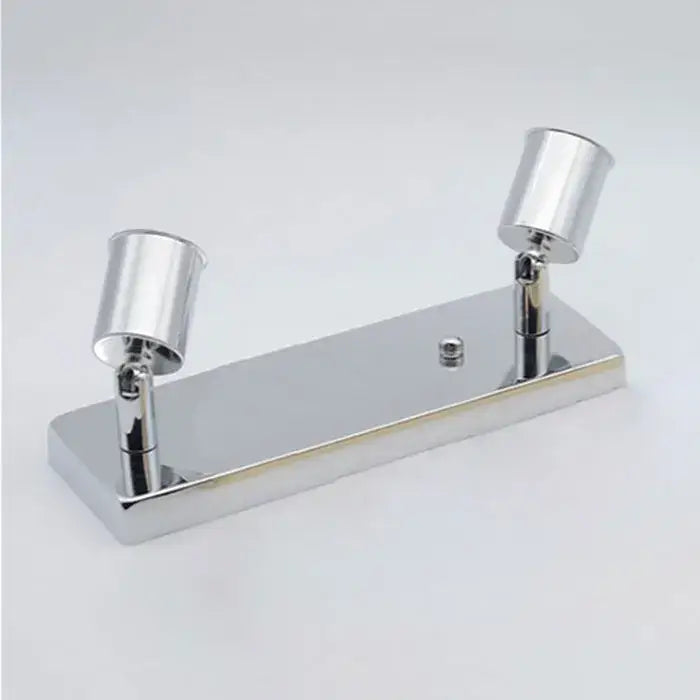 Chrome-finished dual-head wall-mounted spotlight fixture complementing modern adjustable ceramic ceiling light decorbites design