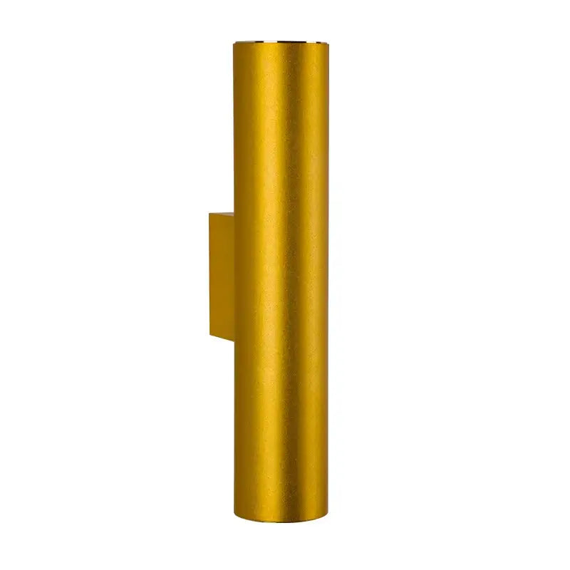 Gold-colored cylindrical wall lamp with sleek modern design for bedroom decorbites cob led wall sconce up down lighting