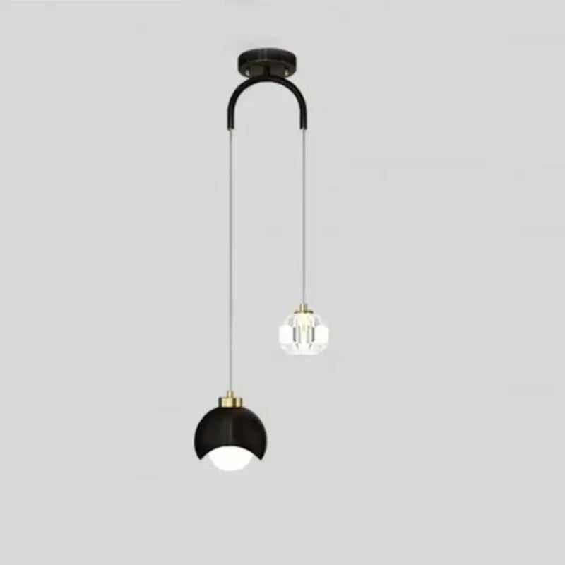 Black and gold modern brass crystal ball pendant lights with spherical and crystal-cut globe shades for bedroom decorbites decor
