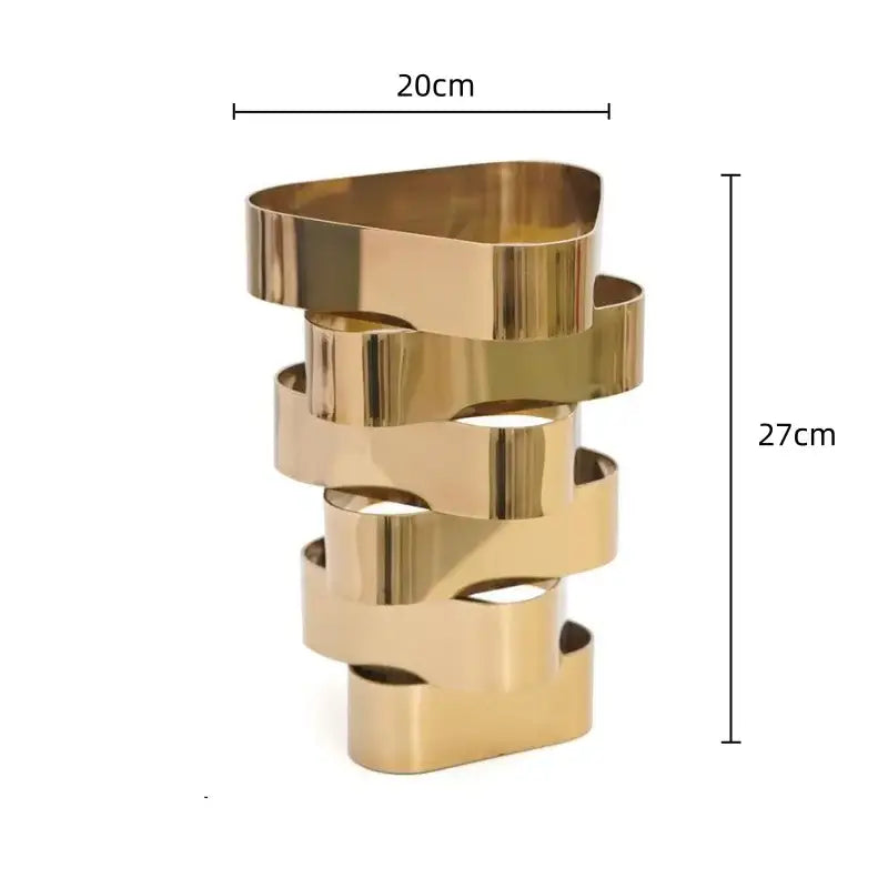 A modern gold-toned metal decorbites geometric vase with interlocking ribbon-like bands for living room decor