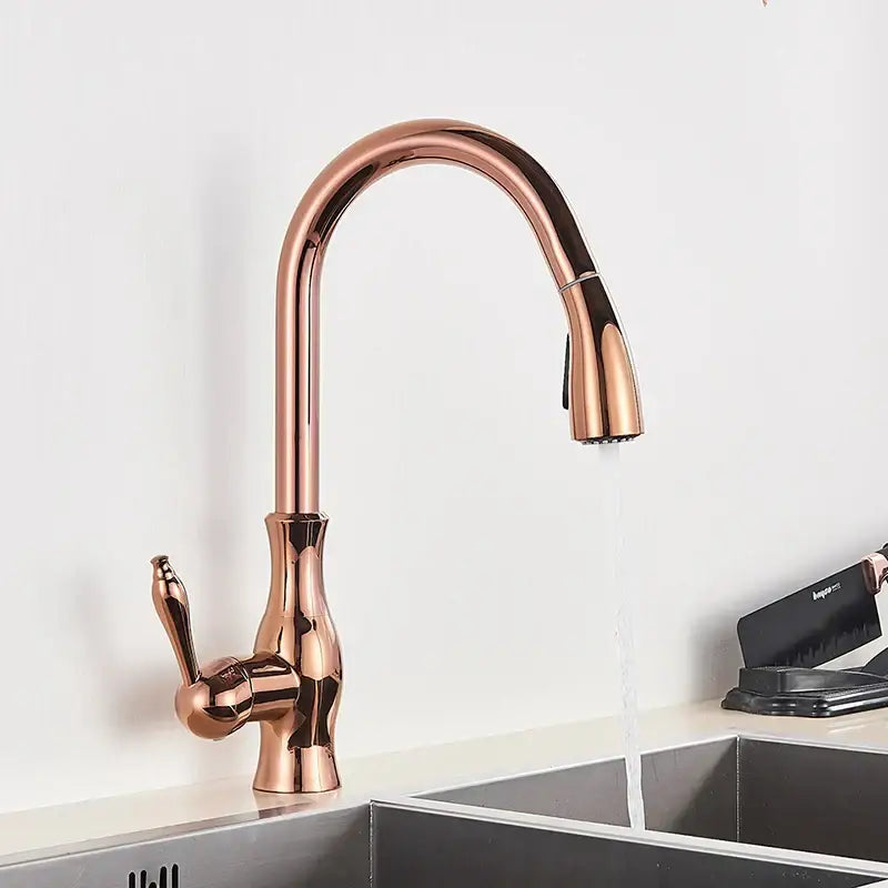 Modern rose gold kitchen faucet with sleek curved spout and pull down sprayer by decorbites gold swivel
