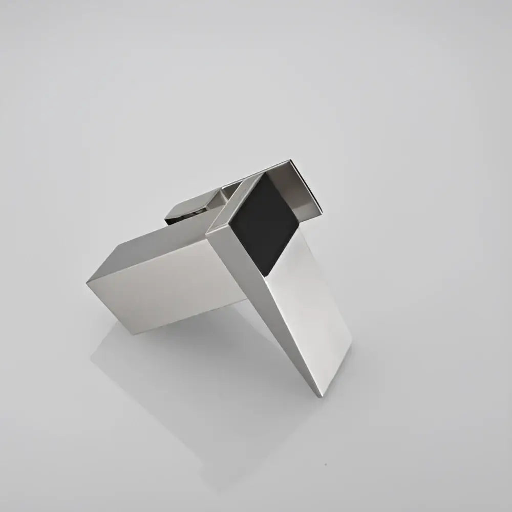 Silver metallic usb flash drive with sleek angular design and black accent for decorbites digital display basin faucet use