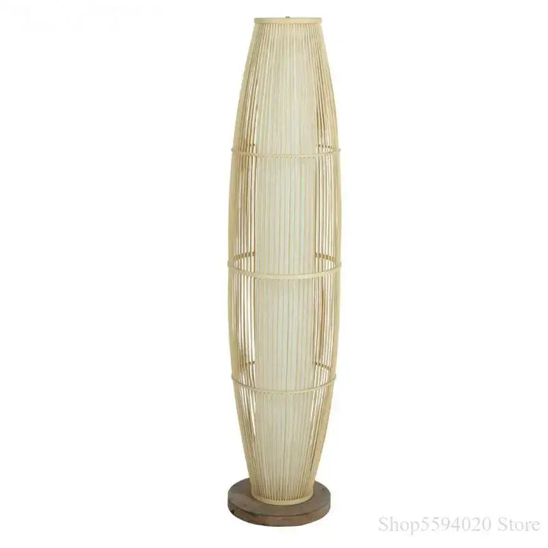 Tall slender floor lamp with natural beige woven rattan shade and dark wood base for warm living room decorbites bamboo floor lamp