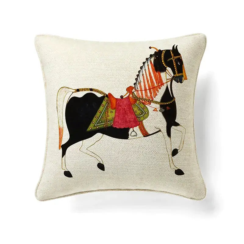 Beige linen cushion cover with embroidered guvinci horse in black white and ornate red gold and green tack for decorbites