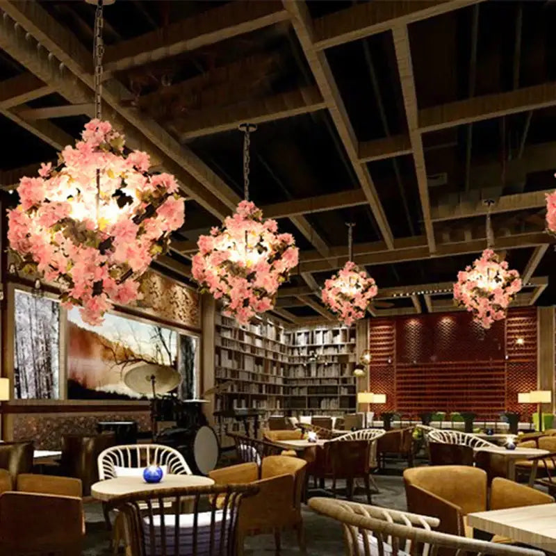 Pink cherry blossoms green plants pendant light dining room featuring decorbites green plants with warm lighting