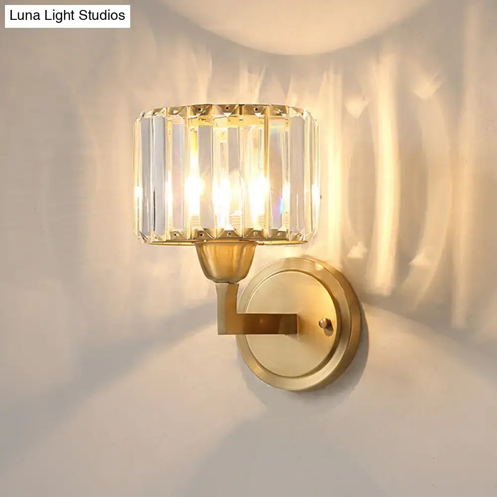 Postmodern gold-toned wall lamp with faceted crystal prism shade and brass fixture height ideal for bedroom sconce