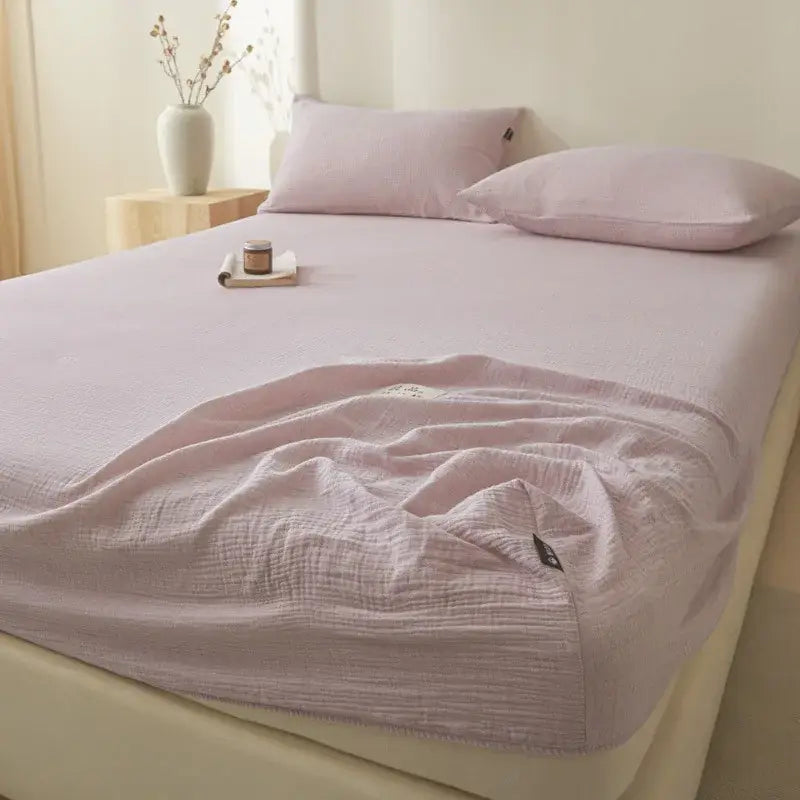 Soft light gray cotton fitted sheet with a soft lavender tone and subtle textured weave for decorbites cotton fitted bed cover
