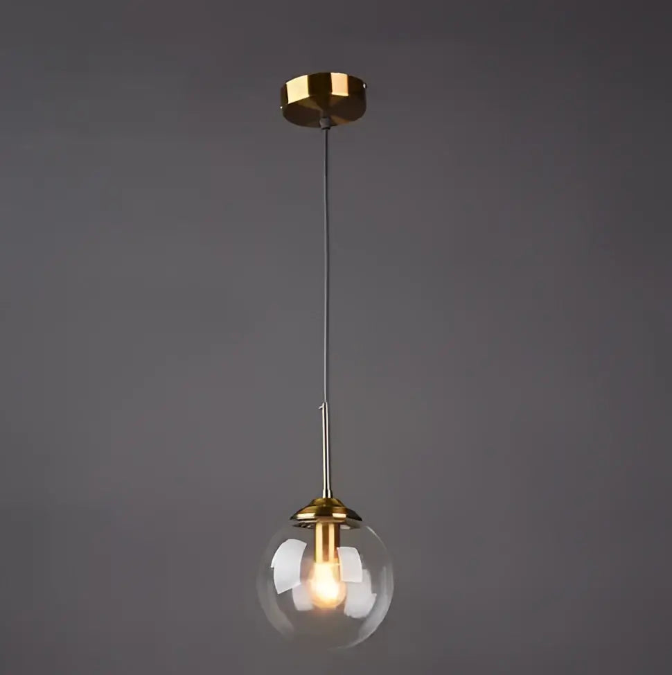 Vintage amber gold glass bubble chandelier with clear glass globe and polished brass accents for kitchen island decorbites glass bubble