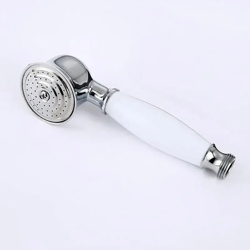Vintage chrome and white ceramic shower hand holder featuring a chrome-finished showerhead with perforated spray face