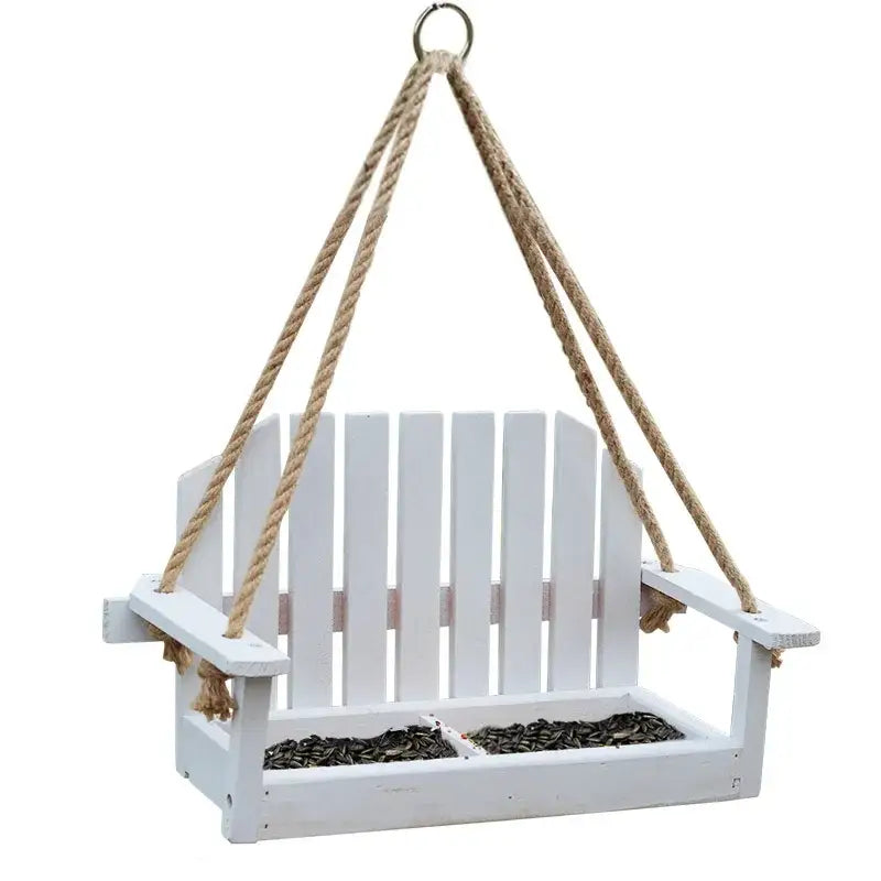 White wooden adirondack bird feeder chair made of wood with natural rope for hanging in garden decor