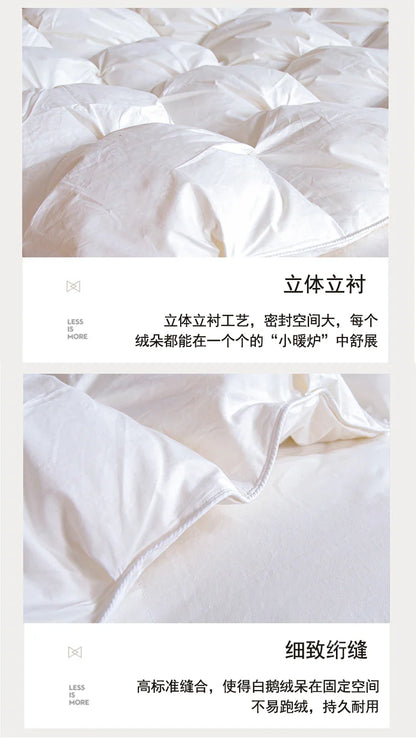 White quilted comforter with plush puffy texture and precise stitching made of 100 percent white goose down and cotton