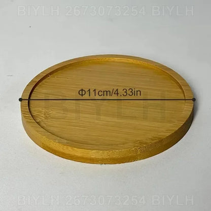 A round light brown bamboo coaster with smooth finish and natural wood grain for hydroponic glass flower pots base tray