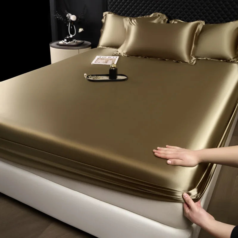 Gold satin fitted sheet and pillowcase set made of 100% mulberry silk for a soft luxury sheet set
