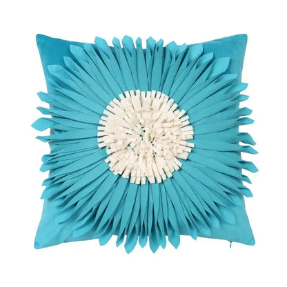 Turquoise velvet cushion cover with 3d blue floral sunburst daisy design and layered fabric petals by decorbites