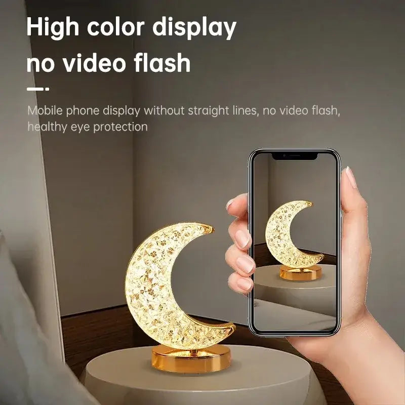 Golden crescent moon-shaped led dimming night light with touch dimming and sparkling textured surface on circular base