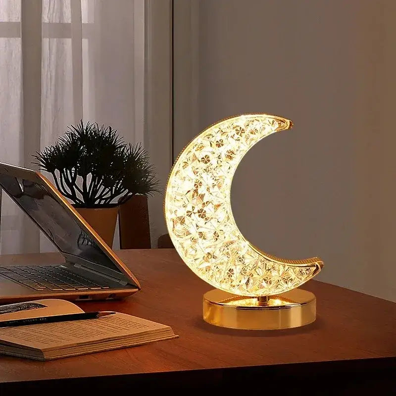 Golden crescent moon led night light with crystal cutouts and polished base featuring touch dimming for ambient decor