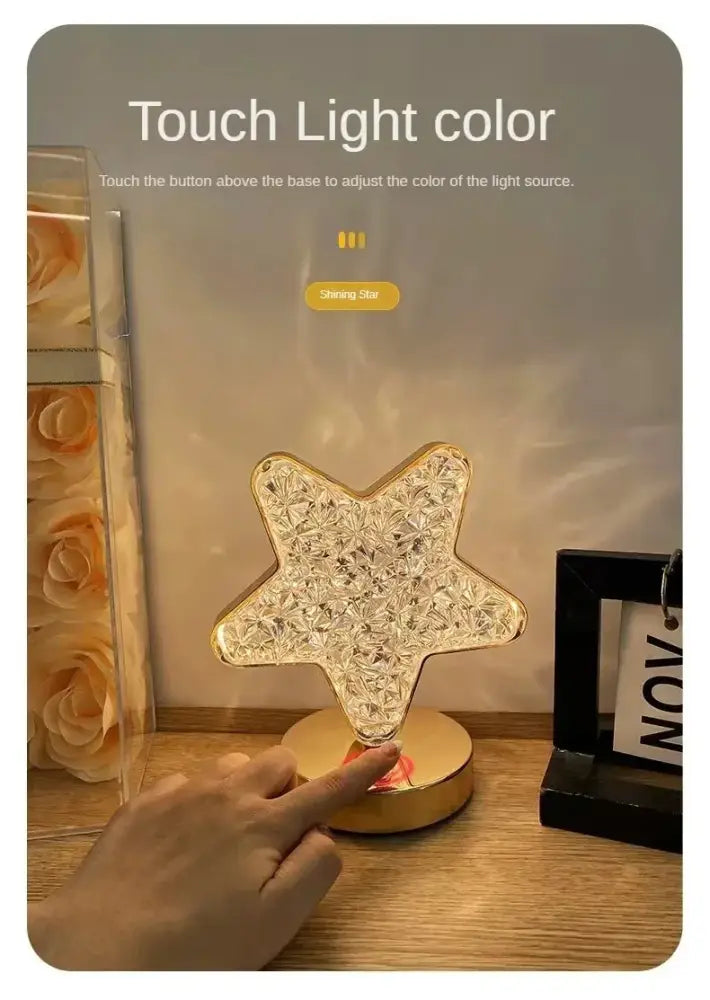 Golden star-shaped led lamp with crystal detailing and circular base featuring touch dimming night light function
