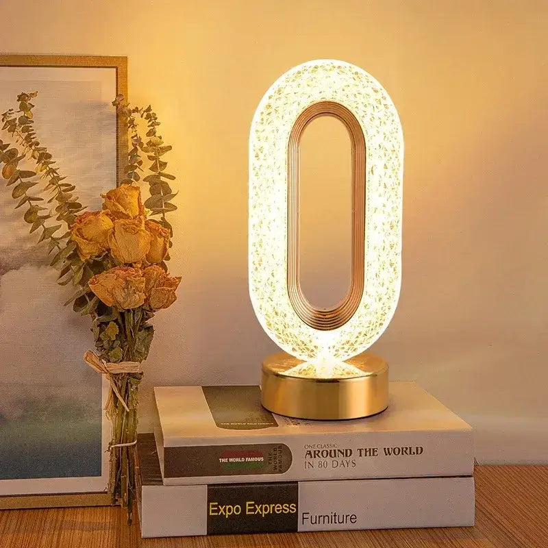 Decorbites™ oval led lamp with textured white surface and gold frame featuring touch dimming night light function