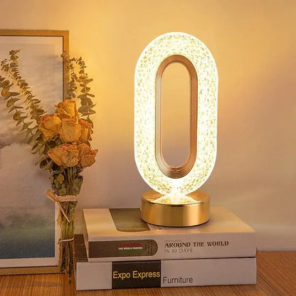 Decorbites™ oval led lamp with textured white surface and gold frame featuring touch dimming night light function