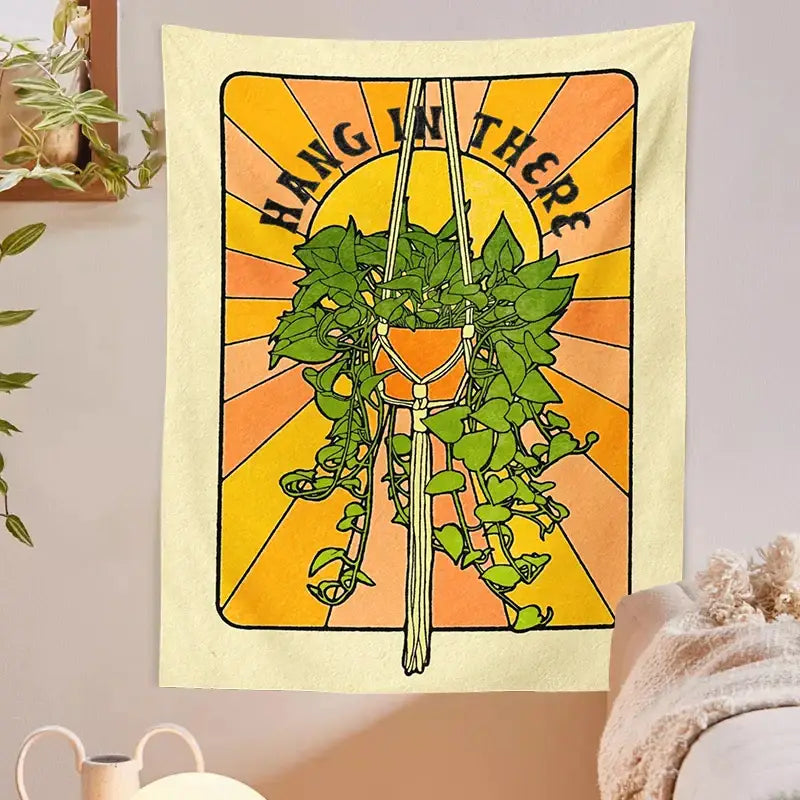 Beige 70s retro decorbites botanical tapestry wall hanging with green leafy plant in macrame hanger and sunburst background