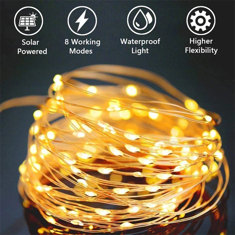Coiled warm white led solar string fairy lights with thin copper wire waterproof for outdoor garden and patio use