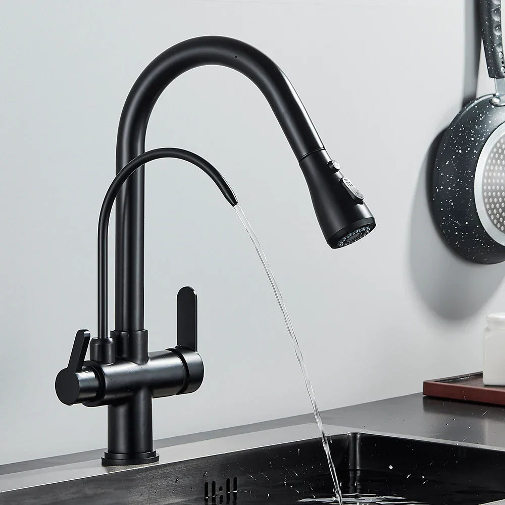 Black kitchen faucet with water flowing into a sink against a light gray wall.