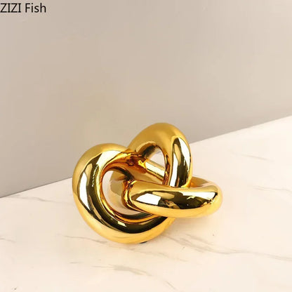 Decorbites™ Vergoldete Knotenornamente: Moderne geometrische Harz-Schreibtischdekoration & Raumhandwerk