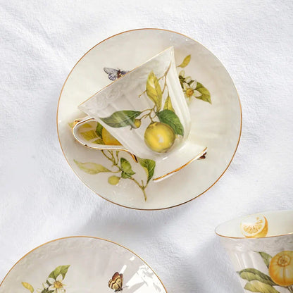 DecorBites™ Gold Edge Cup & Saucer Set: Lemon Teapot, Coffee Mug, Ceramic Plates & Drinkware