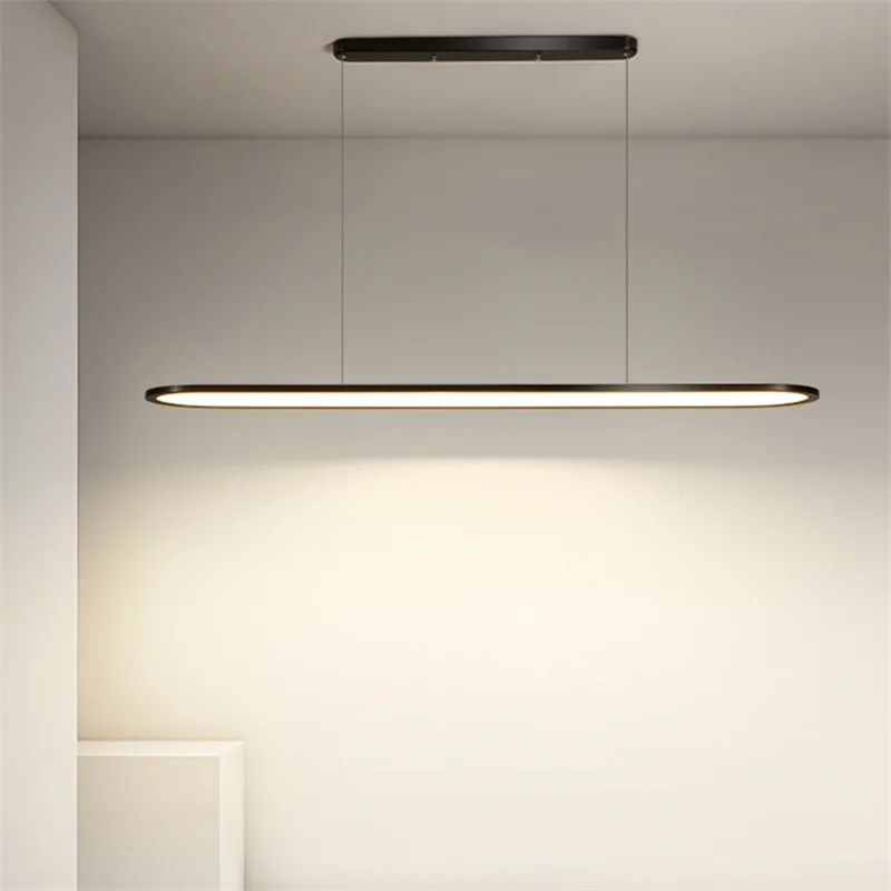 Modern black minimalist decorbites led pendant lights with sleek rectangular design and thin hanging cords for indoor lighting