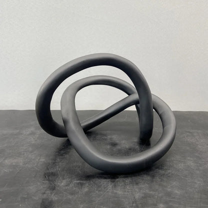 Decorbites™ Goldener Ringknoten Geometrische Harzornamente Handgefertigte Kunstdekoration Figuren